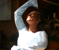picture of a woman in praise